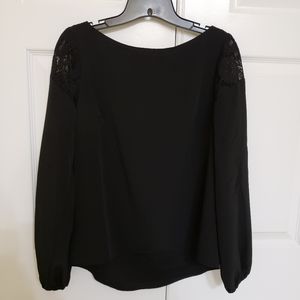 NWT black blouse with mesh embroidery on sleeves